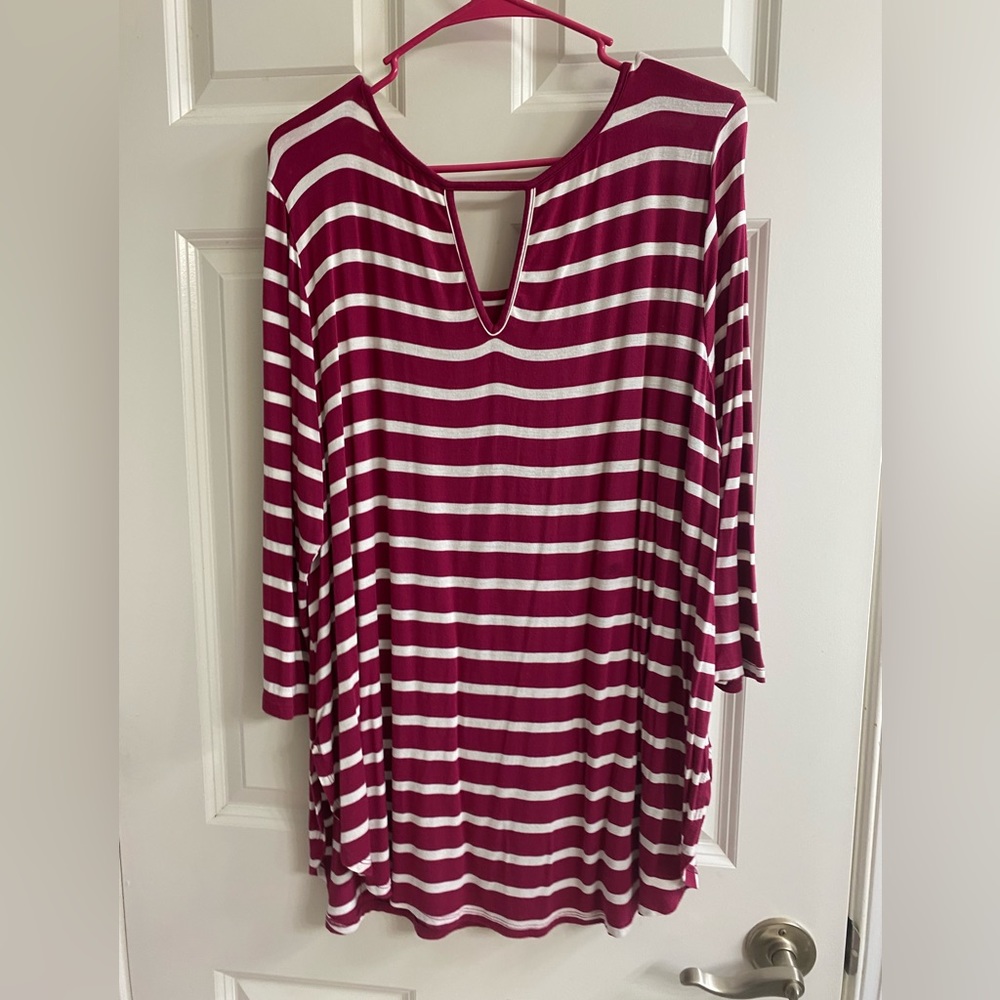 Fushia/ white tunic.